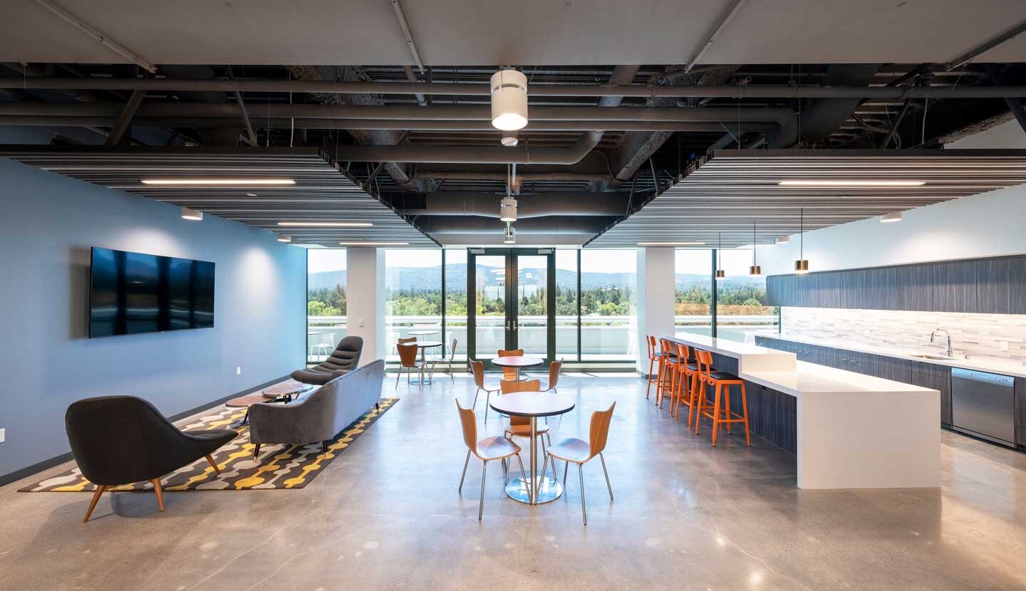 Break room with kitchen and tv area