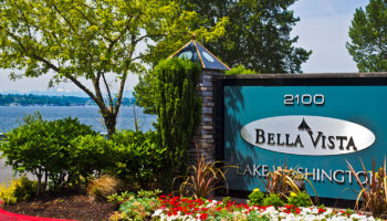 Bella Vita sign with a view of water