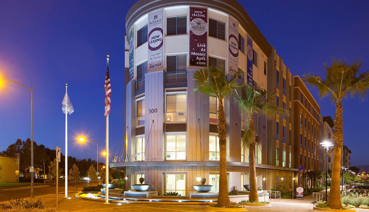 Side view of an apartment building in the evening