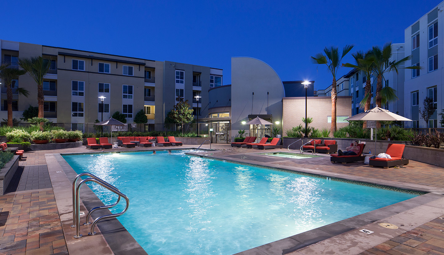 Pool and seating area of the apartment complex