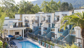 Community pool surrounded by apartments