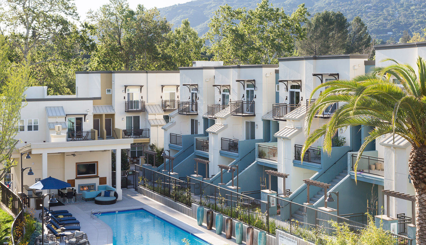 Community pool surrounded by apartments